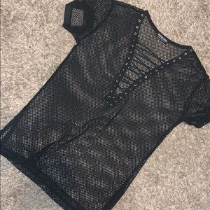 Sheer top with silver holes